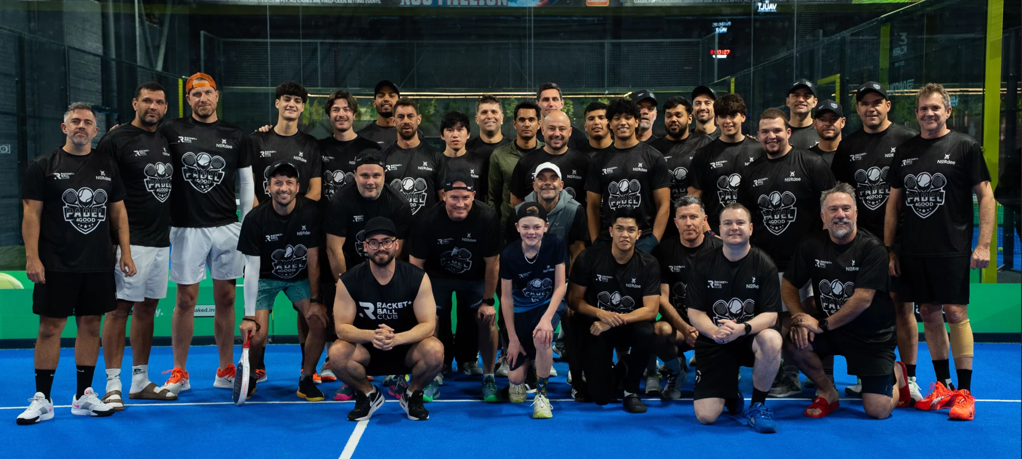 Players at Padel4Good's June 2026 men's tournament at Racket + Ball Padel Club